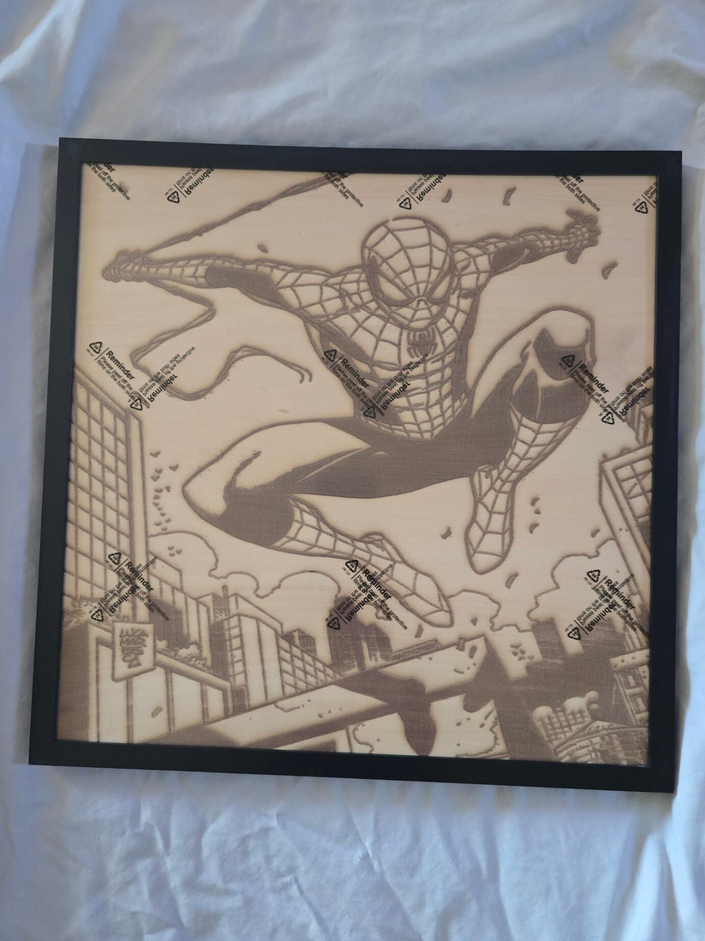 “The Web-Slinger in Motion — 16x16 Laser Engraved Basswood Art”